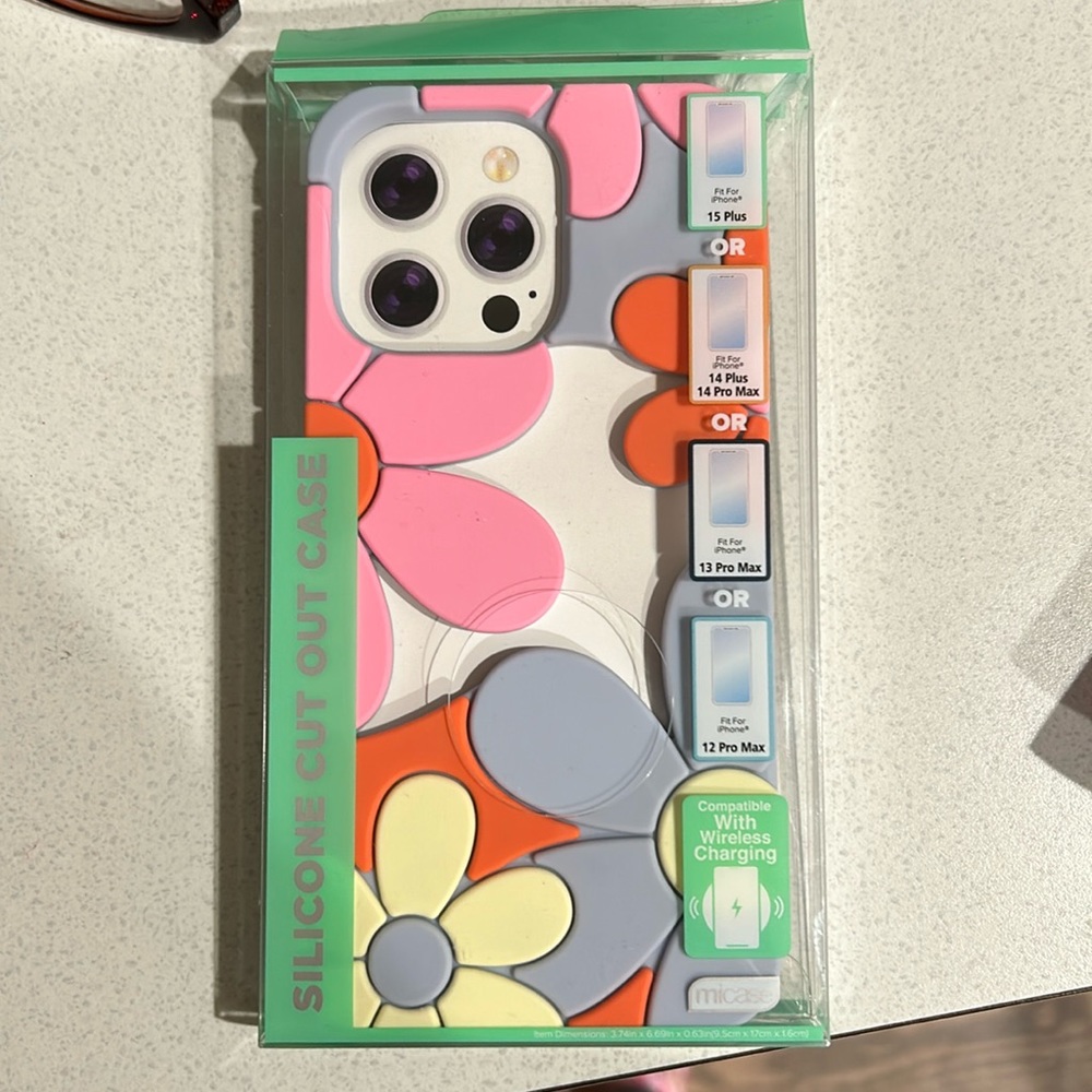 Brand new phone case from 5 below yellow and orange flowers